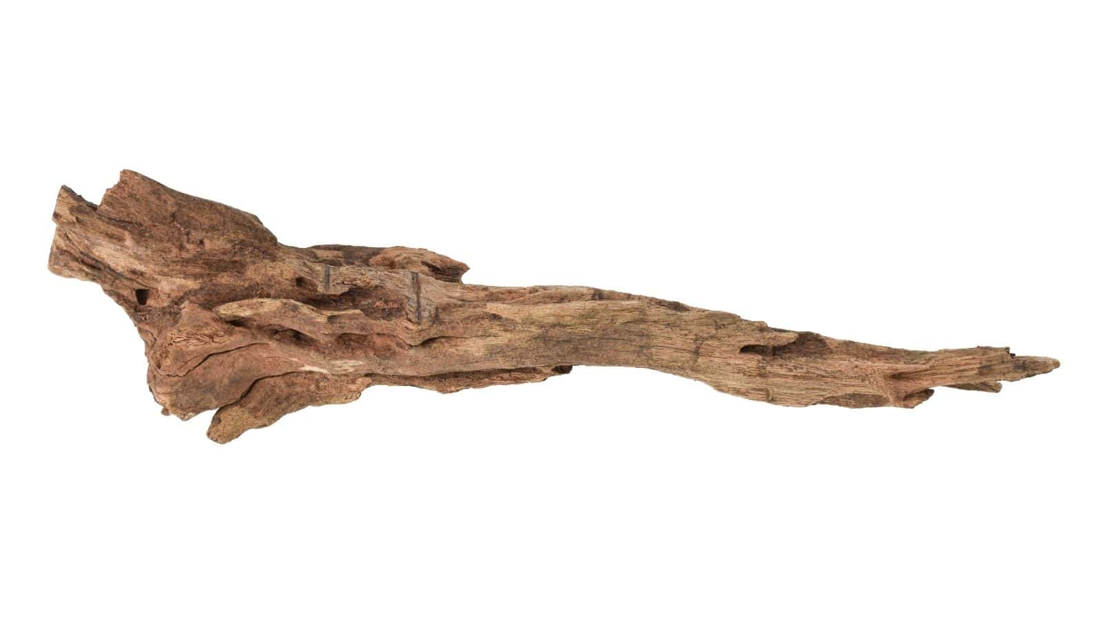 A single piece of weathered driftwood with a rough, textured surface isolated on a white background.